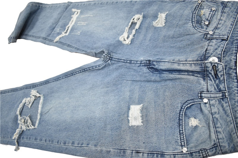 Calça jeans feminina rasgada streetwear com pernas folgadas